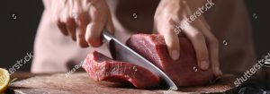 Butcher Cutting Meat