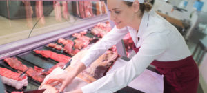 Butcher Stocking Meat